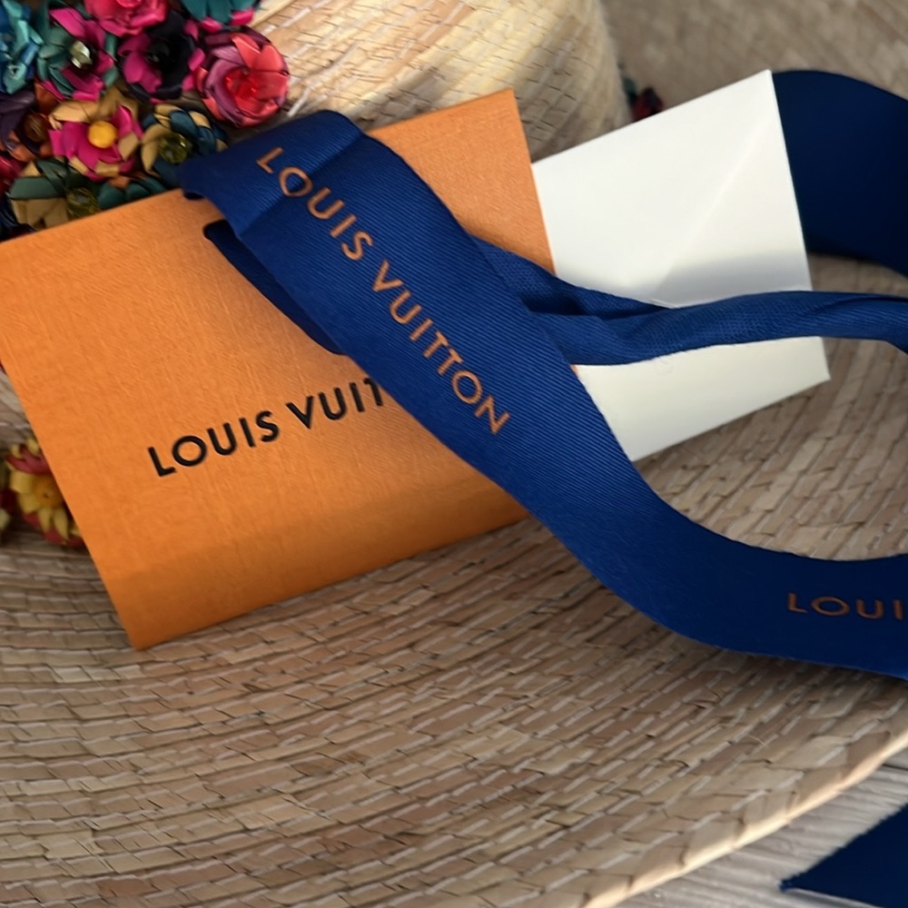 Authentic Louis Vuitton Blue Ribbon and Note Card! Ribbon is 8’ long.